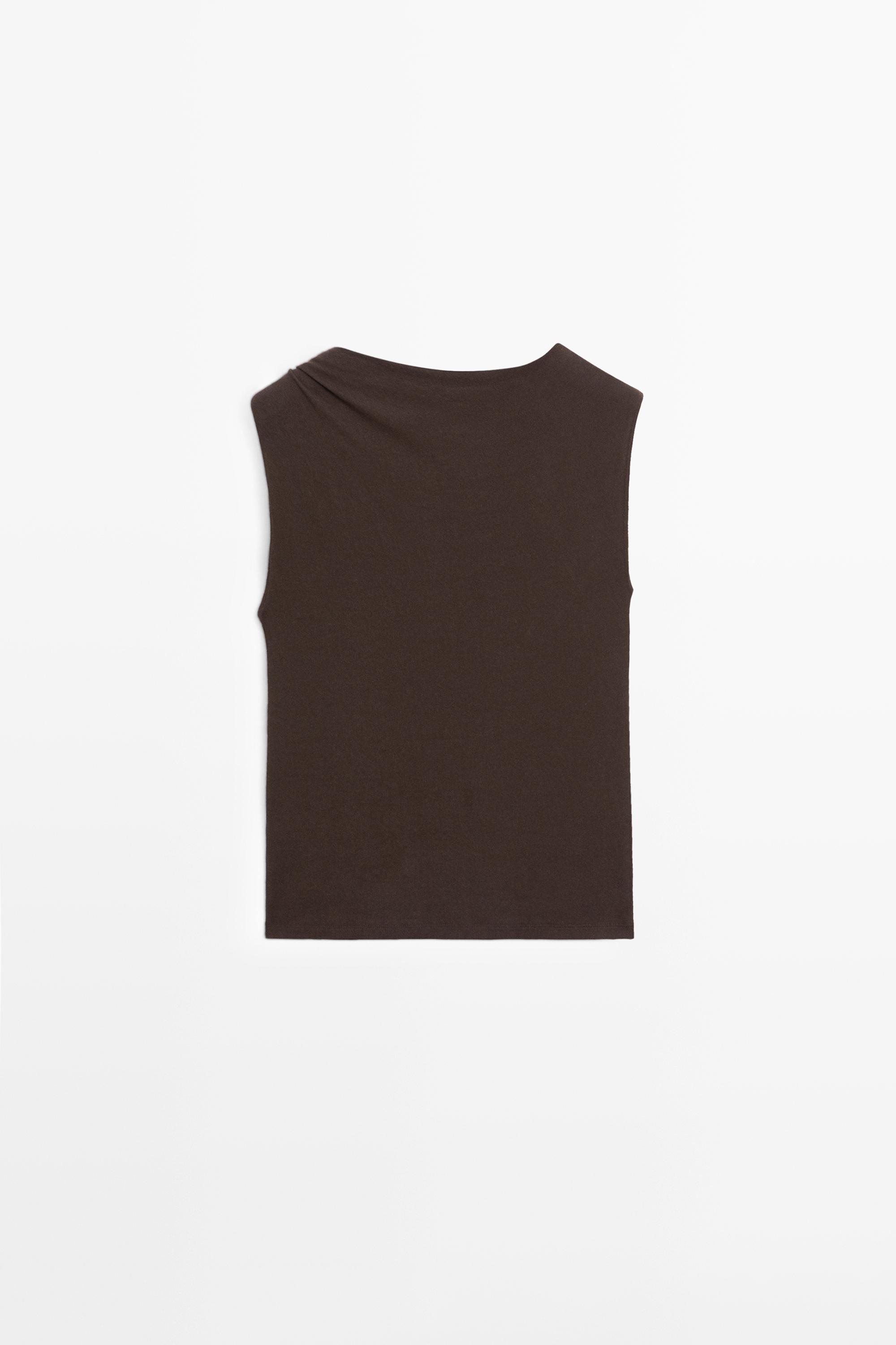 Top asymétrique avec bijou